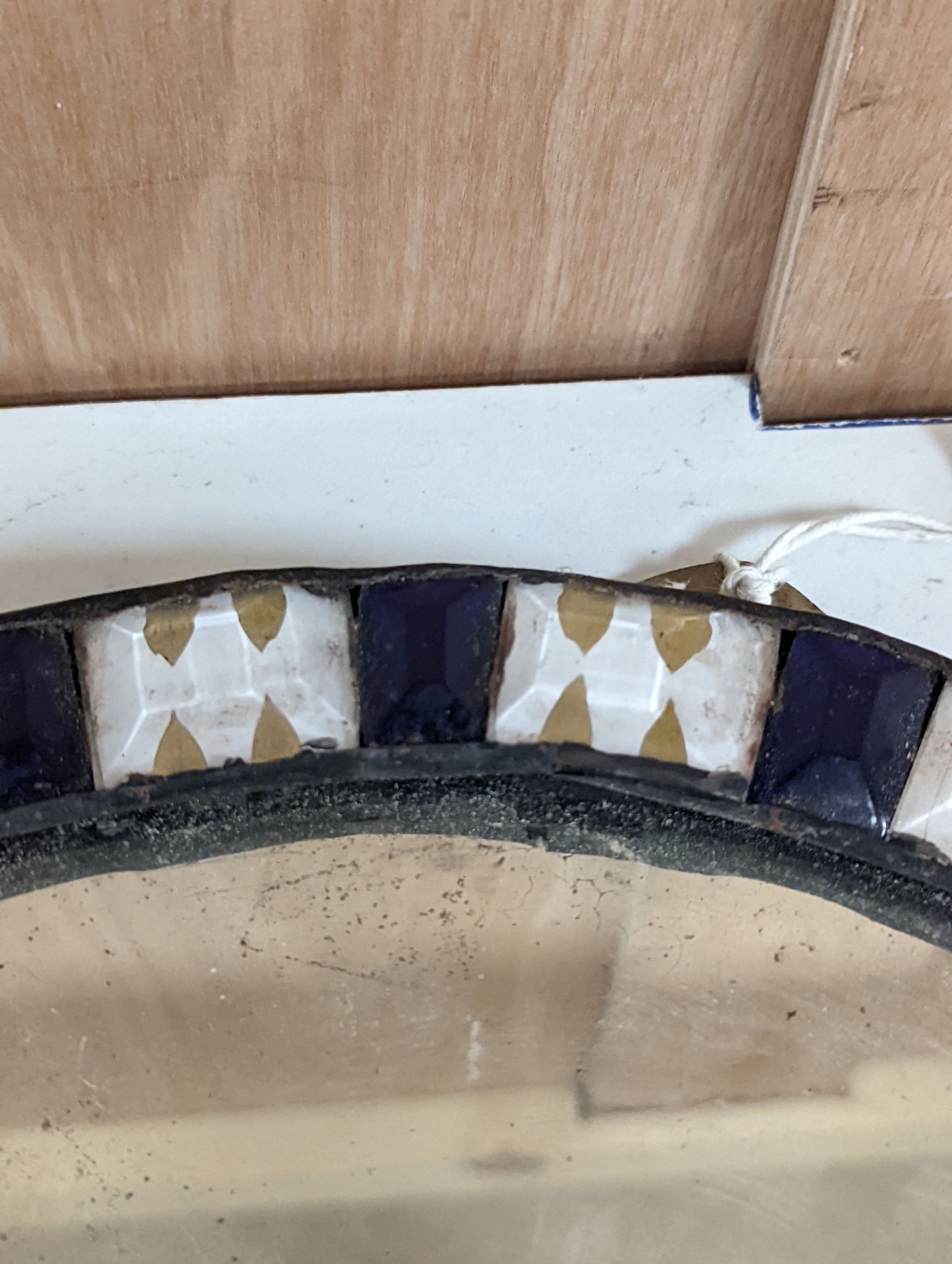 An oval Irish-style wall mirror, 56x41cm